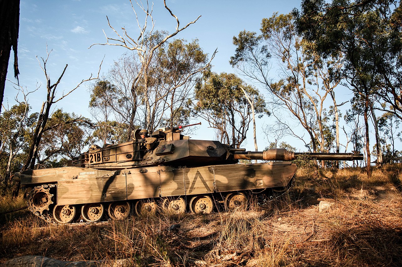 Australian Soldiers engage in simulated combat in a M1A1 Abrams Tanks during exercise Hamel 15 a sub-mission of exercise Talisman Sabre in Shoalwater Bay Training Area, Queensland, Australia on July 14, 2015. Talisman Sabre is a biennial exercise that provides an invaluable opportunity for nearly 30,000 U.S. and Australian defense forces to conduct operations in a combined joint and interagency environment that will increase both countries' ability to plan and execute a full range of operations from combat missions to humanitarian assistance efforts.  (U.S. Army photo by Spc. Jordan Talbot/Released)