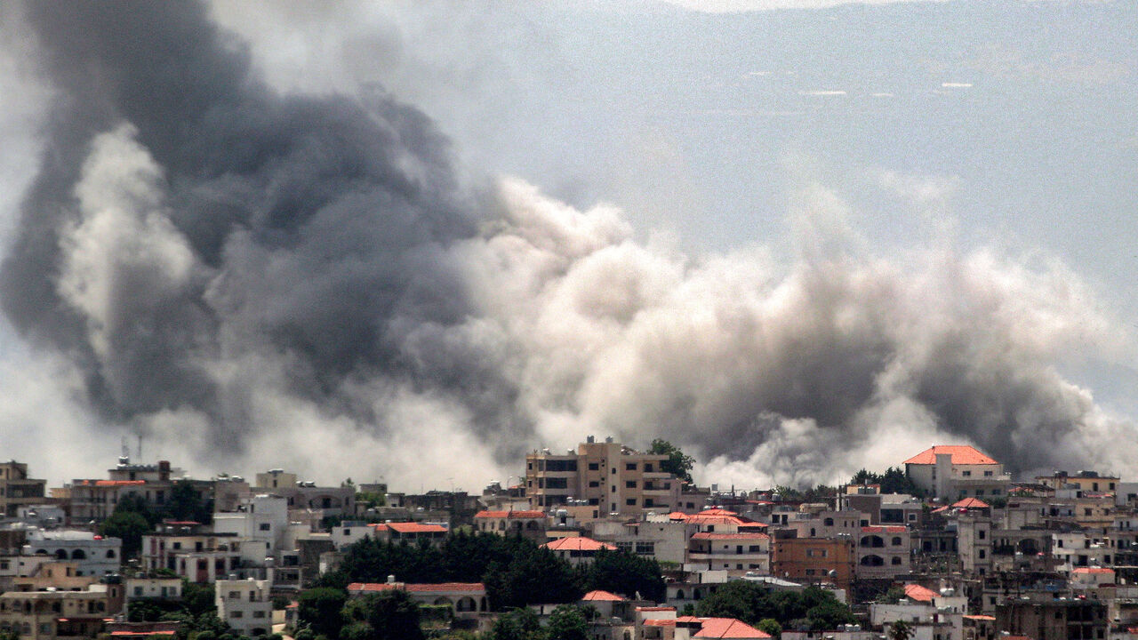 Smoke billows during Israeli bombardment on the village of Khiam in south Lebanon near the border with Israel on June 19, 2024 amid ongoing cross-border tensions as fighting continues between Israel and Hamas in the Gaza Strip. (Photo by RABIH DAHER / AFP) / “The erroneous mention[s] appearing in the metadata of this photo by RABIH DAHER has been modified in AFP systems in the following manner: [June 19] instead of [June 8]. Please immediately remove the erroneous mention[s] from all your online services and delete it (them) from your servers. If you have been authorized by AFP to distribute it (them) to third parties, please ensure that the same actions are carried out by them. Failure to promptly comply with these instructions will entail liability on your part for any continued or post notification usage. Therefore we thank you very much for all your attention and prompt action. We are sorry for the inconvenience this notification may cause and remain at your disposal for any further information you may require.”