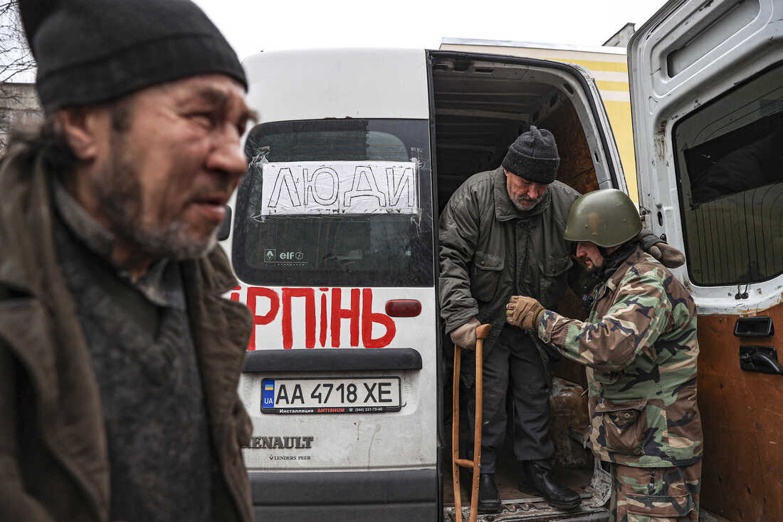 KYIV, UKRAINE - MARCH 30: Civilians evacuated from Irpin are brought to the center established in the Sviatoshinski district of Kyiv, Ukraine on March 30, 2022. Evacuation of civilians continues in Irpin, near the capital Kyiv amid Russian attacks on Ukraine. (Photo by Metin Aktas/Anadolu Agency via Getty Images)