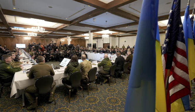 Participants attend the meeting of the 'Ukraine Defense Contact Group' at Ramstein Air Base in Ramstein, Germany, Friday, Jan. 20, 2023. Defense leaders are gathering at Ramstein Air Base in Germany Friday to hammer out future military aid to Ukraine, amid ongoing dissent over who will provide the battle tanks that Ukrainian leaders say they desperately need(AP Photo/Michael Probst)