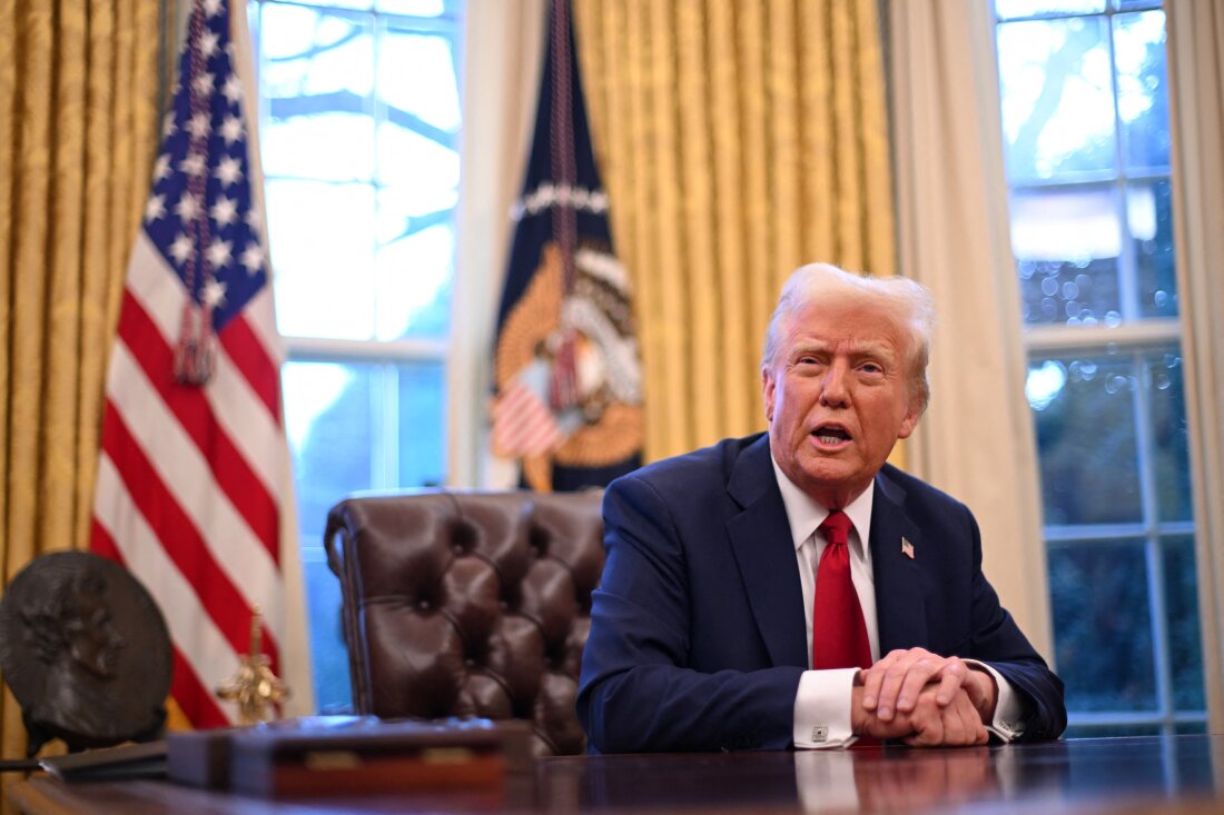 US President Donald Trump speaks to journalists in the Oval Office of the White House in Washington, DC, on January 30, 2025. (Photo by ROBERTO SCHMIDT / AFP)