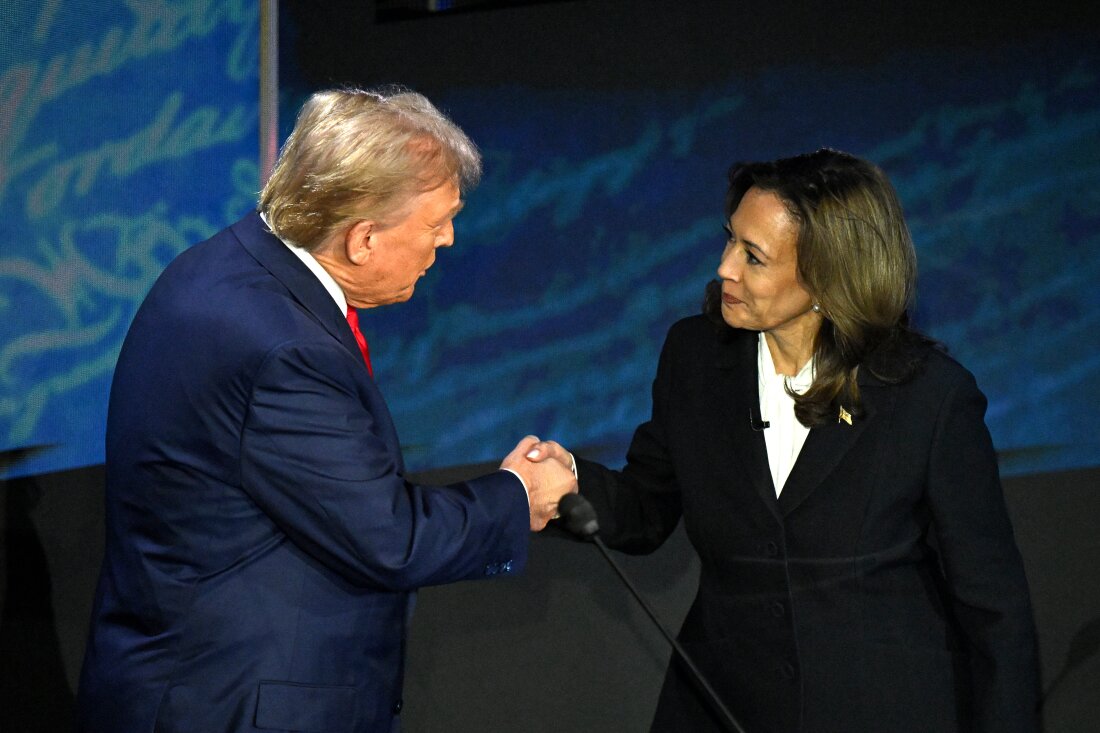 US Vice President and Democratic presidential candidate Kamala Harris (R) shakes hands with former US President and Republican presidential candidate Donald Trump during a presidential debate at the National Constitution Center in Philadelphia, Pennsylvania, on September 10, 2024. (Photo by SAUL LOEB / AFP)