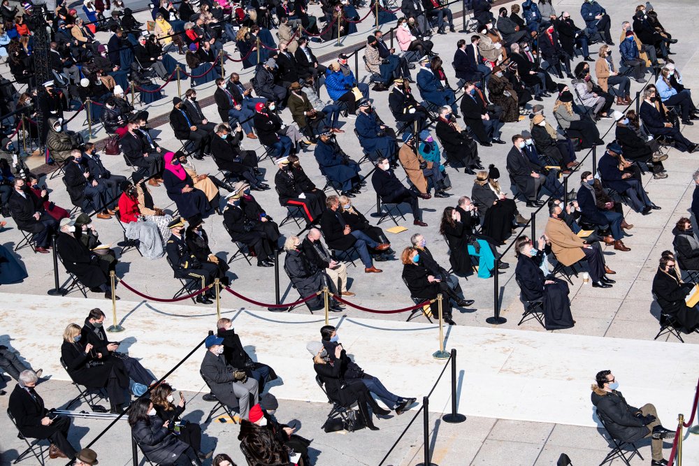 (210120) -- WASHINGTON, Jan. 20, 2021 (Xinhua) -- Photo taken on Jan. 20, 2021 shows people attending the inauguration ceremony of the 46th President of the United States in Washington, D.C., the United States. At an unusual inauguration closed to public due to the still raging coronavirus pandemic, U.S. President-elect Joe Biden was sworn in as the 46th President of the United States on Wednesday at the West Front of the Capitol, which was breached two weeks ago by violent protesters trying to overturn his election victory. (Xinhua/Liu Jie) (Photo by Xinhua/Sipa USA)